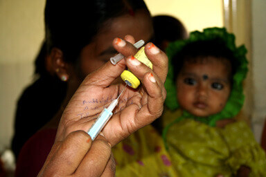The development of global health innovations like vaccines can product cost savings long term. Photo credit: PATH